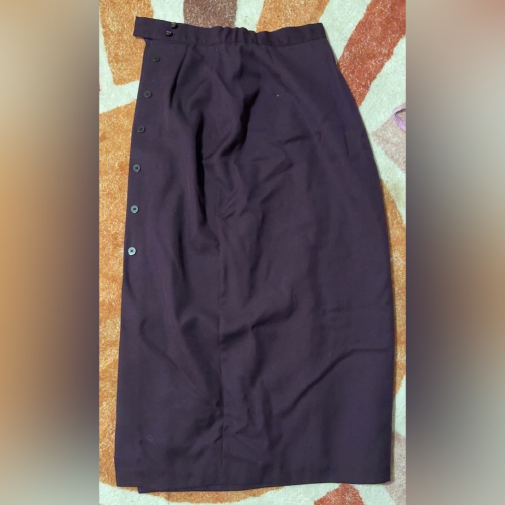 Dark purple button up skirt, goes past the knees